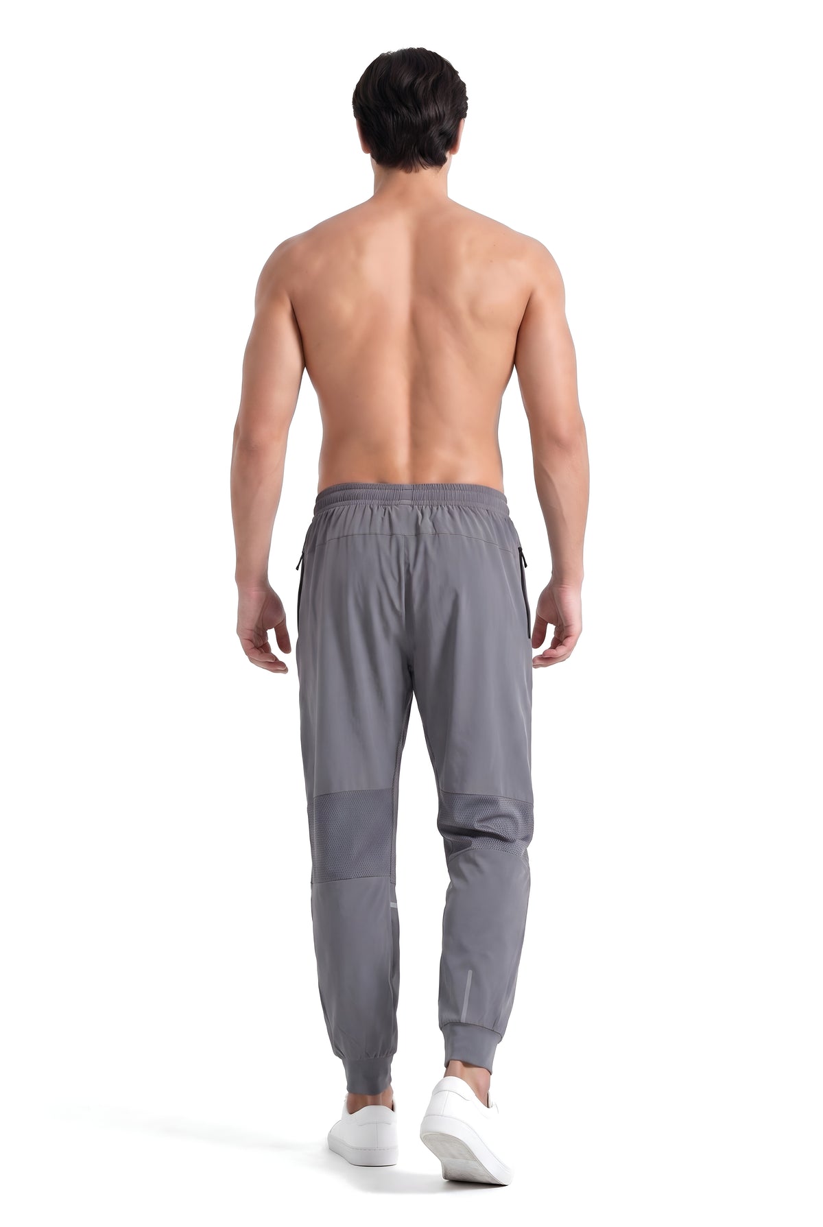 Men's Mesh Knee Running Track Pants in Dark Grey, back view on male model, showing the mesh behind the knees, Ascendia