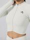 Graceful neckline detail of the ShapeSculpt Fitness Top in White - ascendiastore