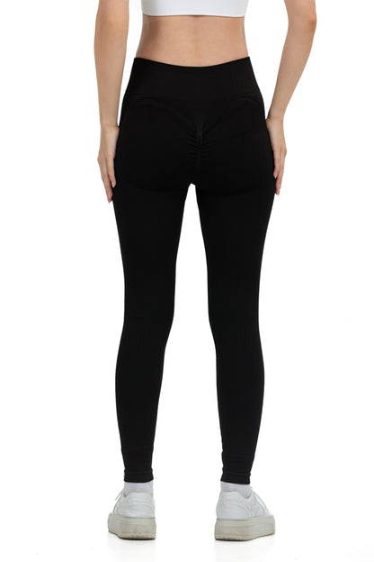 Seamless Lines Leggings in Black, back view showing the scrunch seat seam and ribbed waistband, Ascendia