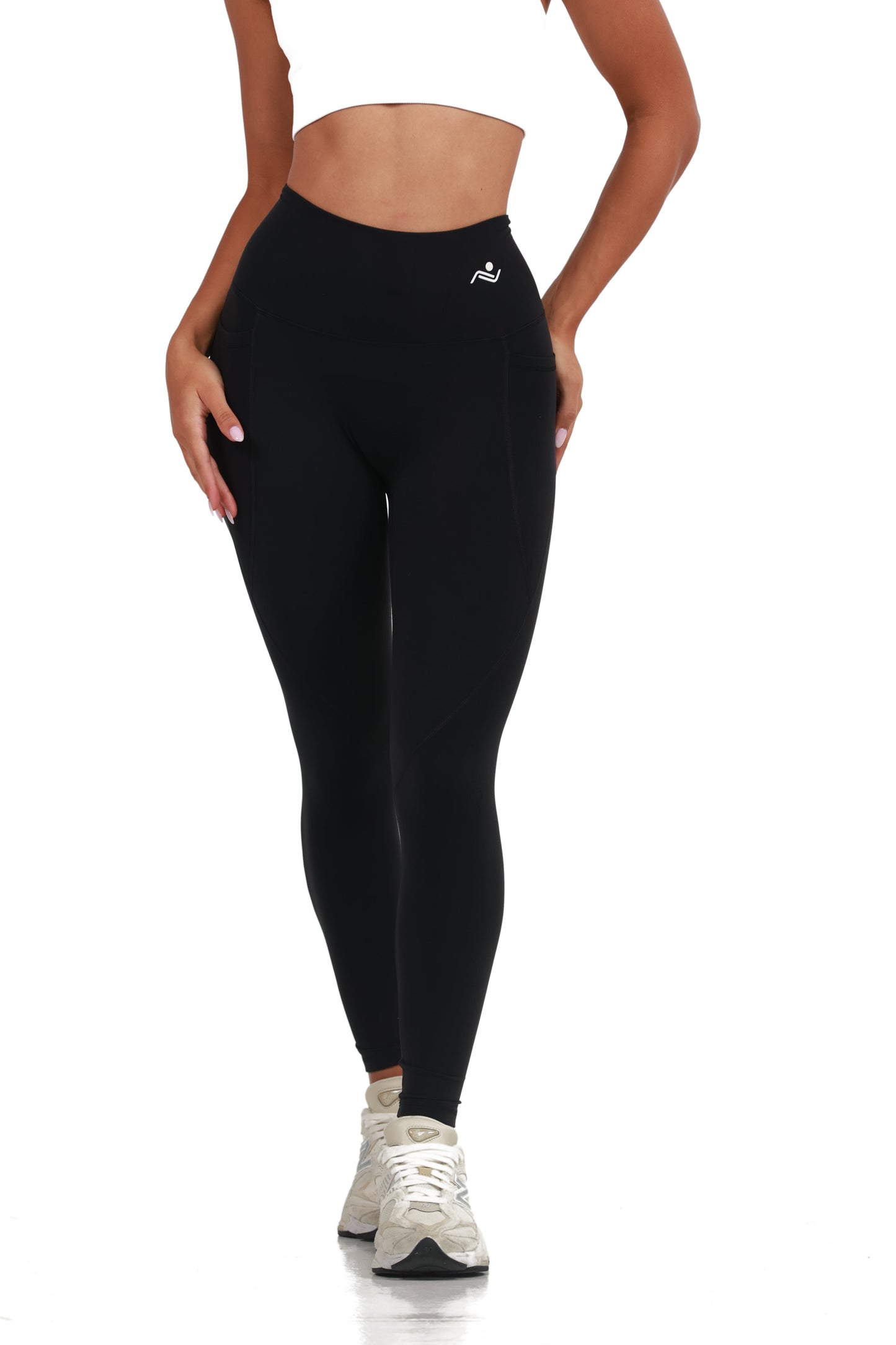 Active Fit Leggings in Black, front view with both hands in the side pockets, Ascendia