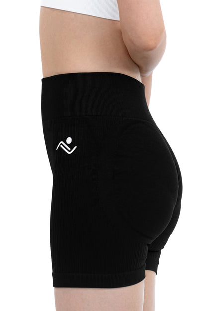 Shape Sculpt Fitness Shorts in Black, side profile showing the hip logo and ribbed hem, Ascendia
