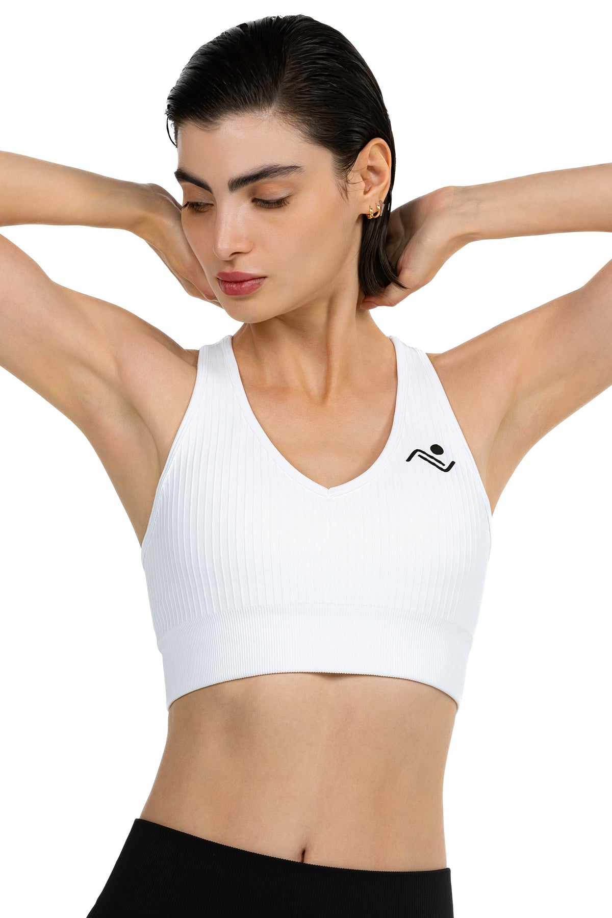 ProFit Athletic Bra in White, front view with arms raised on model, Ascendia