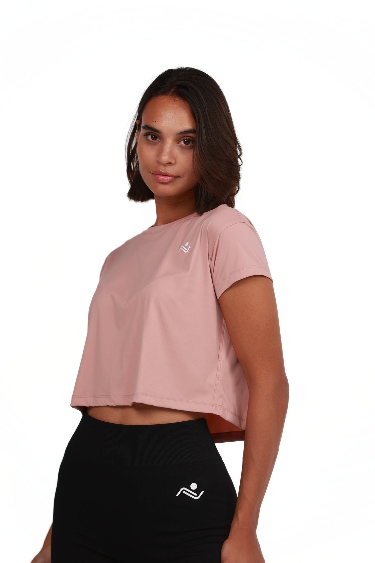 Women's Crop Tee in Blush, three-quarter view on model, Ascendia