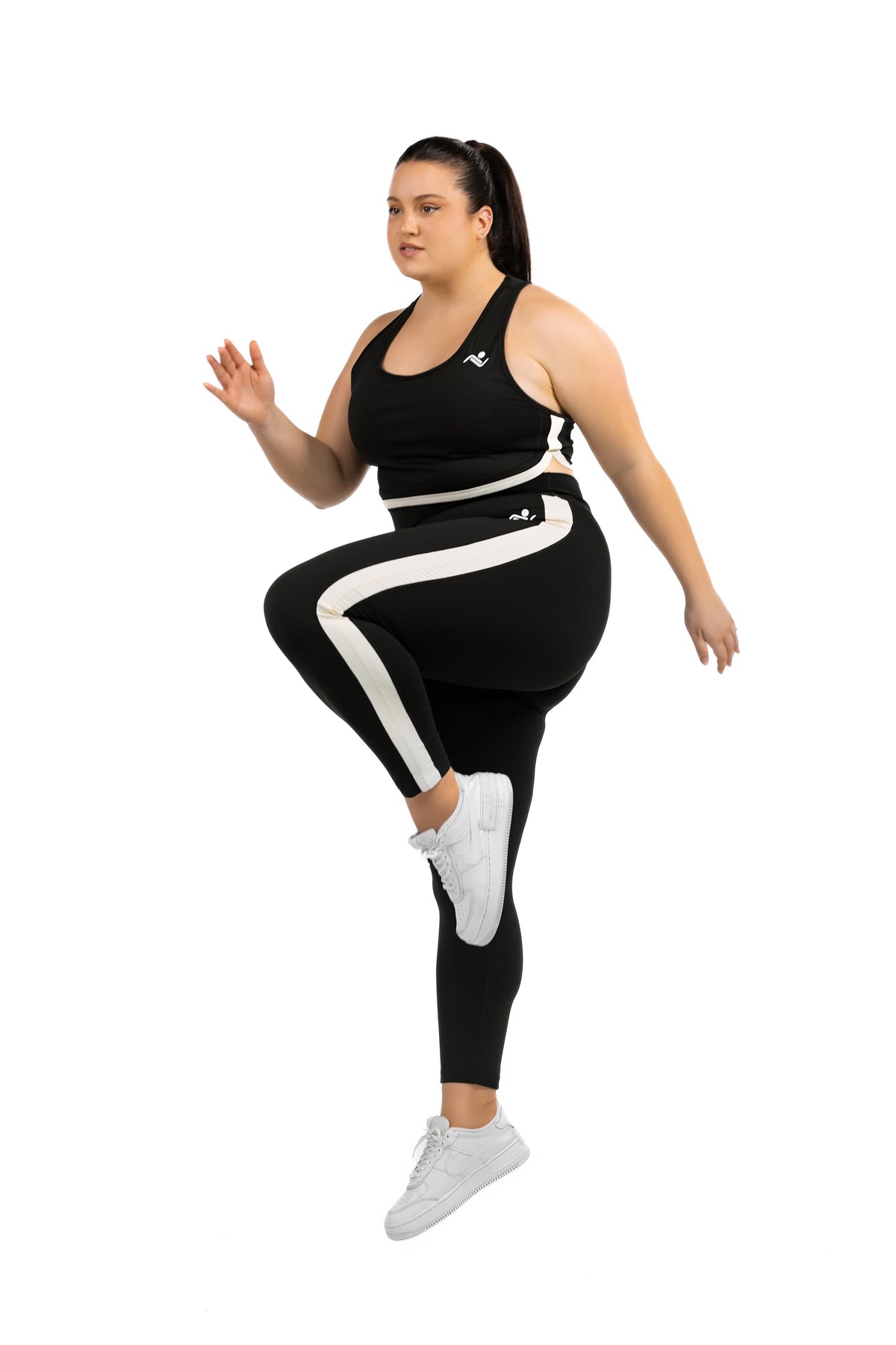FitFusion Workout Set (XL–4XL) in Black, knee raise in motion on model, Ascendia