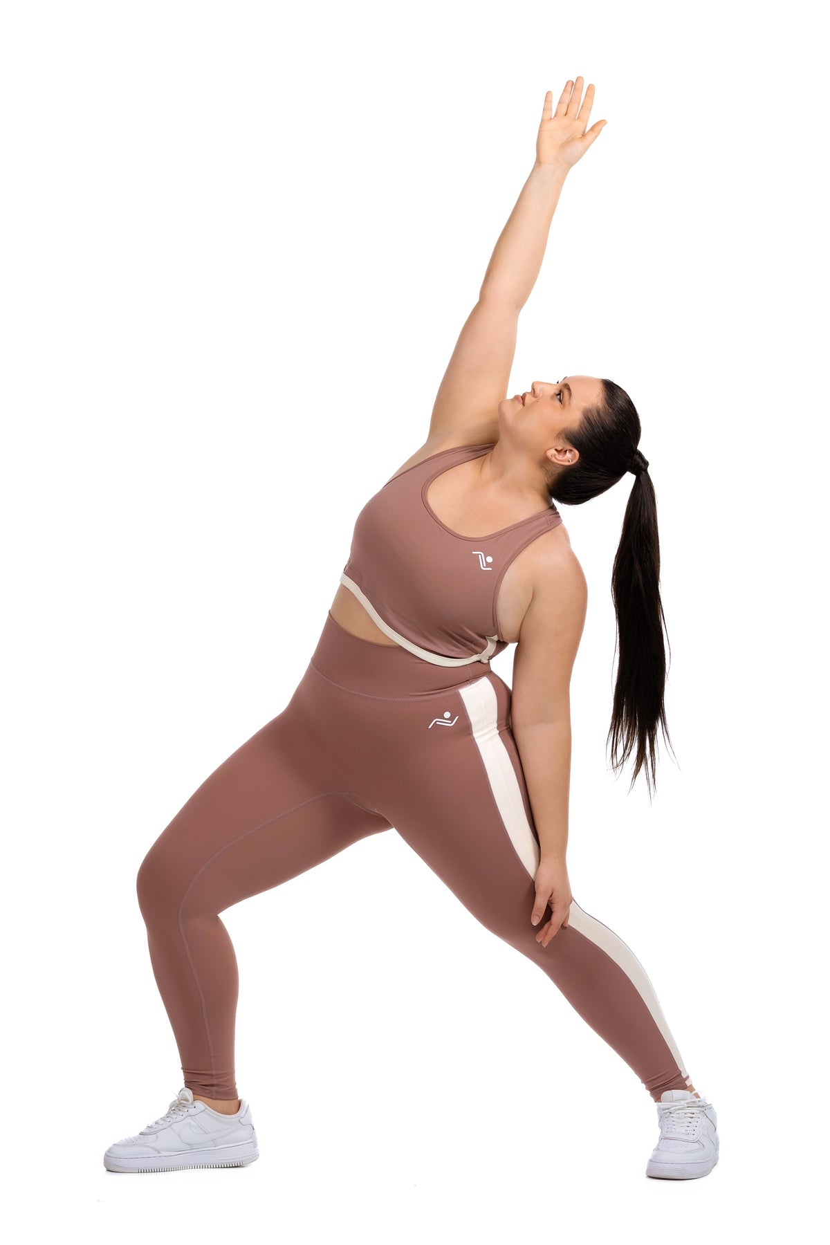 FitFusion Workout Set (XL–4XL) in Rosewood, side stretch with arm raised on model, Ascendia