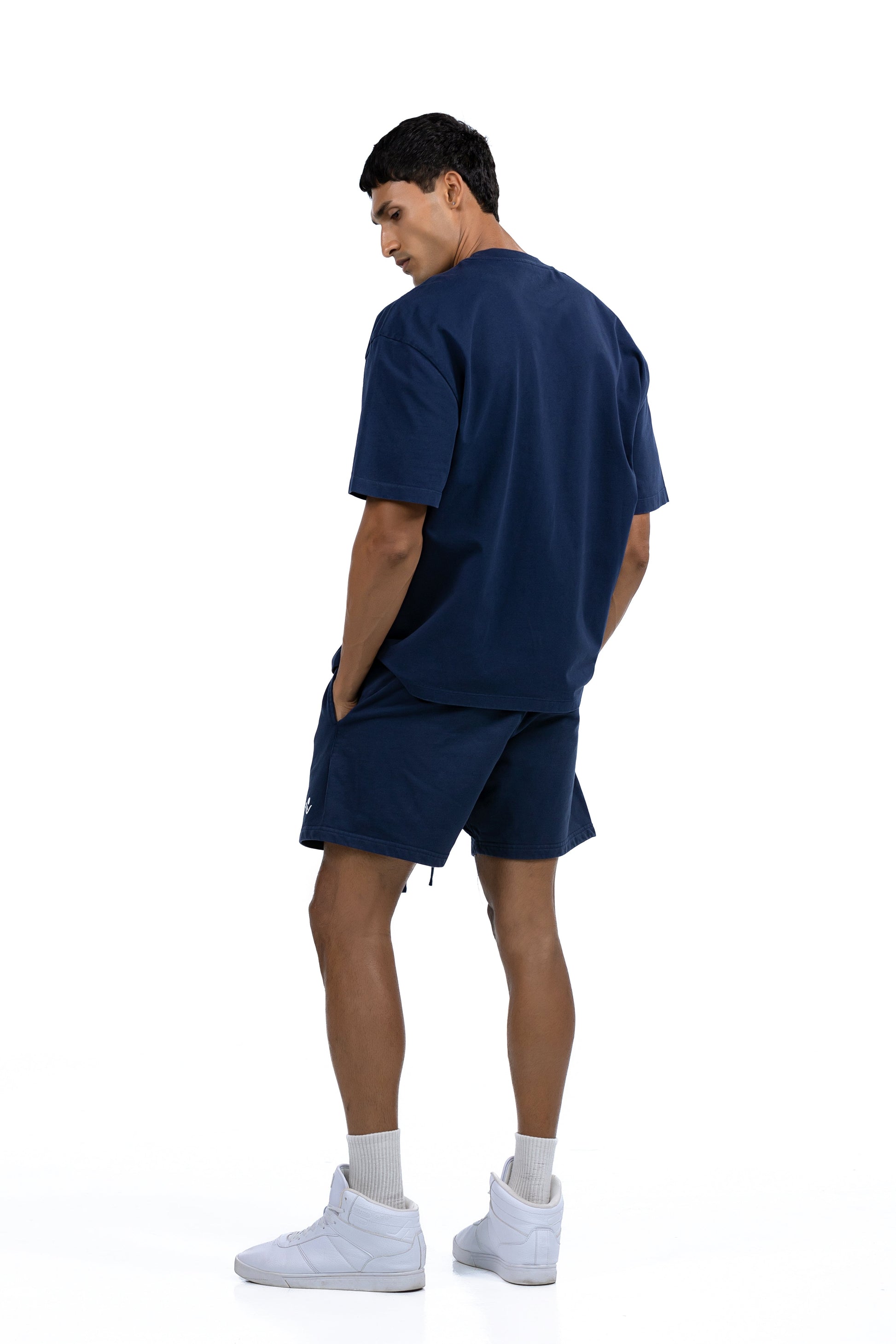 Workout Tee & Short Set in Navy, full-length back view on male model, Ascendia