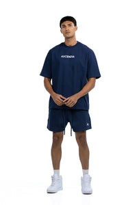 Workout Tee & Short Set in Navy, front view on male model with hands clasped at the waist, Ascendia