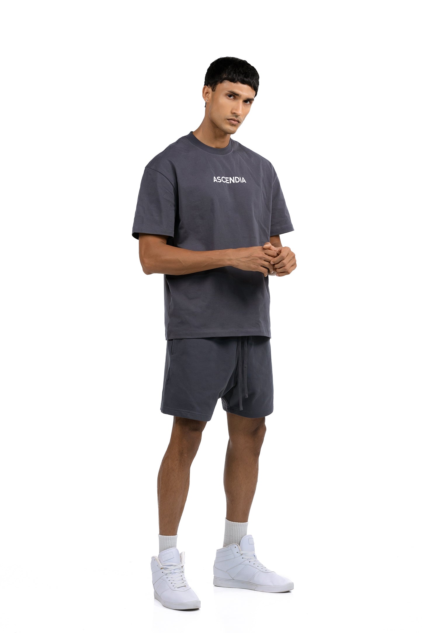 Workout Tee & Short Set in Charcoal, three-quarter front view on male model, Ascendia