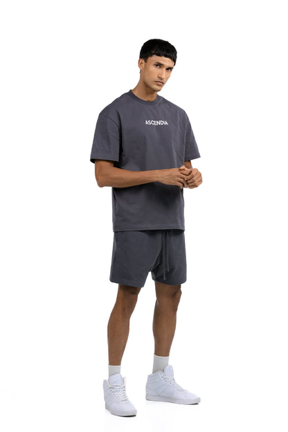 Workout Tee & Short Set in Charcoal, three-quarter front view on male model, Ascendia