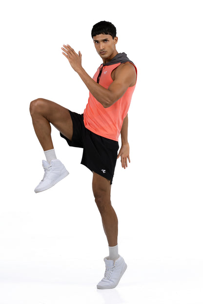 Sleeveless Workout Hoodie in Coral & Charcoal, full length action shot with knee raised, Ascendia
