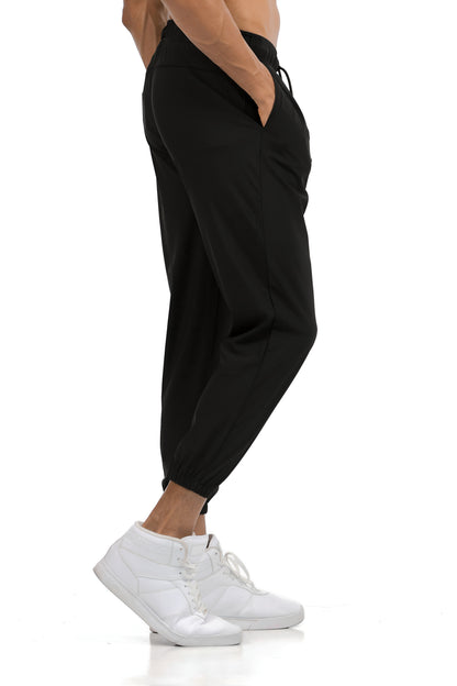 Men's Loose Gym Joggers in Black, side view on model, Ascendia