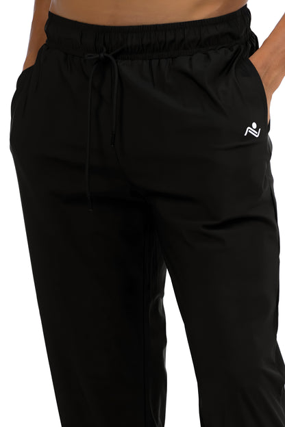Men's Loose Gym Joggers in Black, close view of the drawcord waistband, side pocket and hip logo, Ascendia