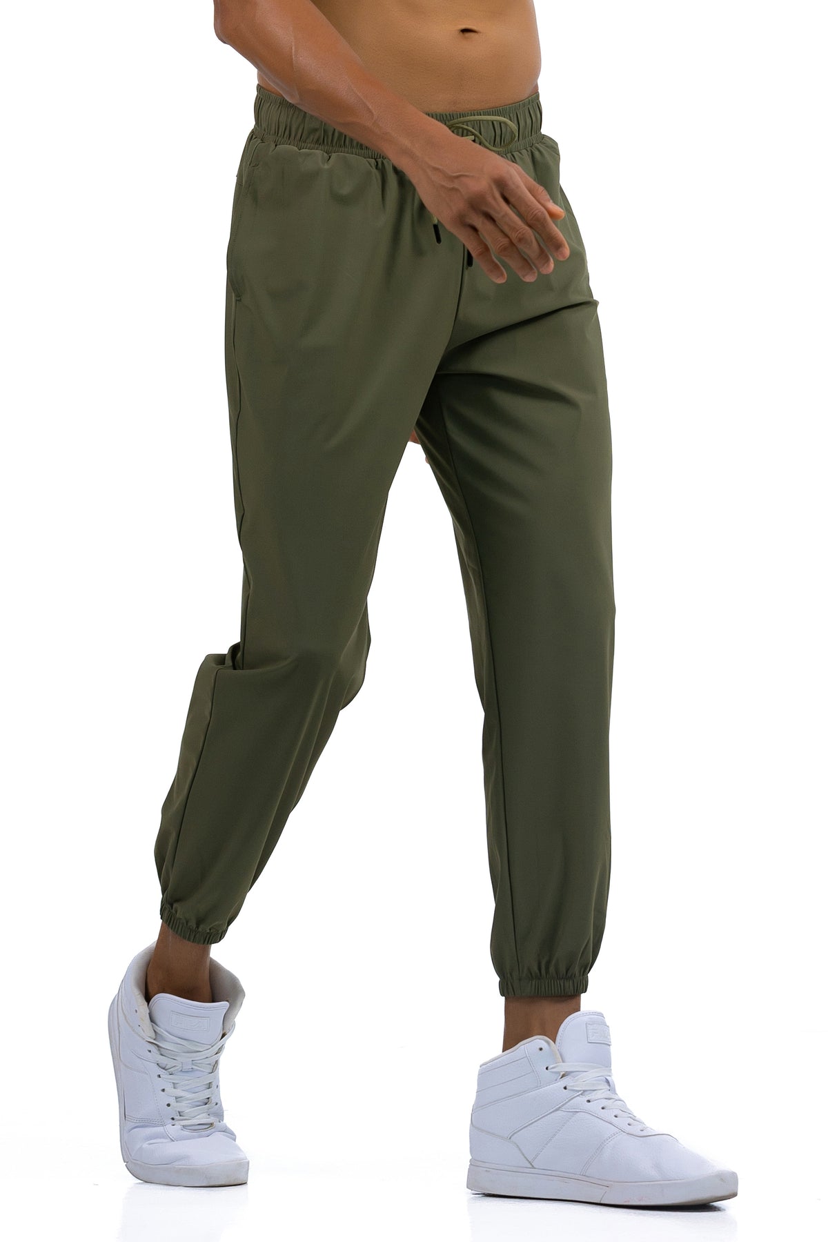 Men's Loose Fit Joggers in Olive, side view on model showing the tapered leg, Ascendia
