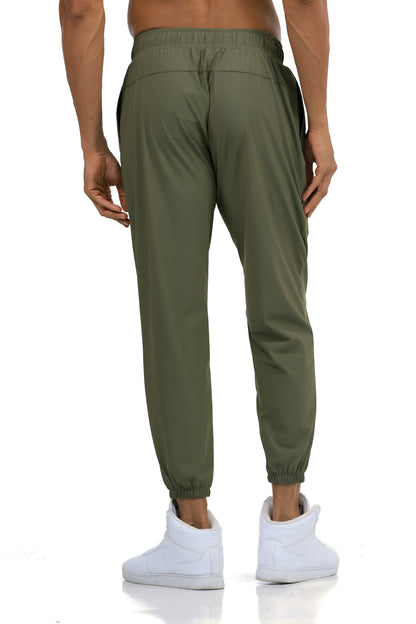 Men's Loose Gym Joggers in Olive, back view on model, Ascendia