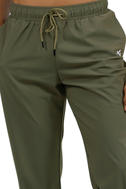Men's Loose Fit Joggers in Olive, close view of the drawcord waistband, side pocket and hip logo, Ascendia