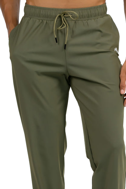 Men's Loose Gym Joggers in Olive, close view of the drawcord waistband, side pocket and hip logo, Ascendia