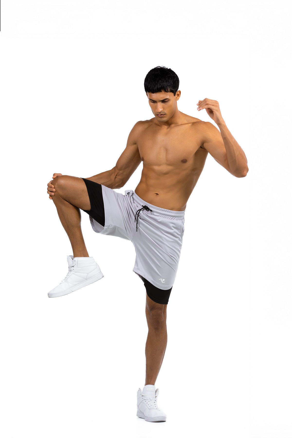 Men's 2-in-1 Training Shorts with Phone Pocket in Light Grey, full-length action shot on model, Ascendia