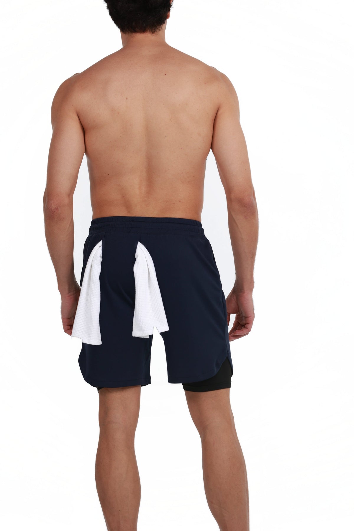 Men's 2-in-1 Training Shorts with Phone Pocket in Midnight Navy, back view with a gym towel on the back loop, Ascendia