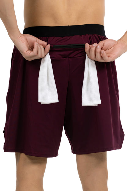 Men's Towel Loop Gym Shorts in Dark Maroon, back view with a gym towel threaded behind the zip panel, Ascendia