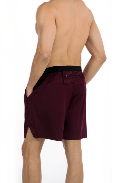 Men's Towel Loop Gym Shorts in Dark Maroon, three-quarter back view with the zip pocket on model, Ascendia