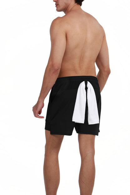 Side Pocket Loose Fit Shorts in Black, back view with a gym towel on the back loop, Ascendia