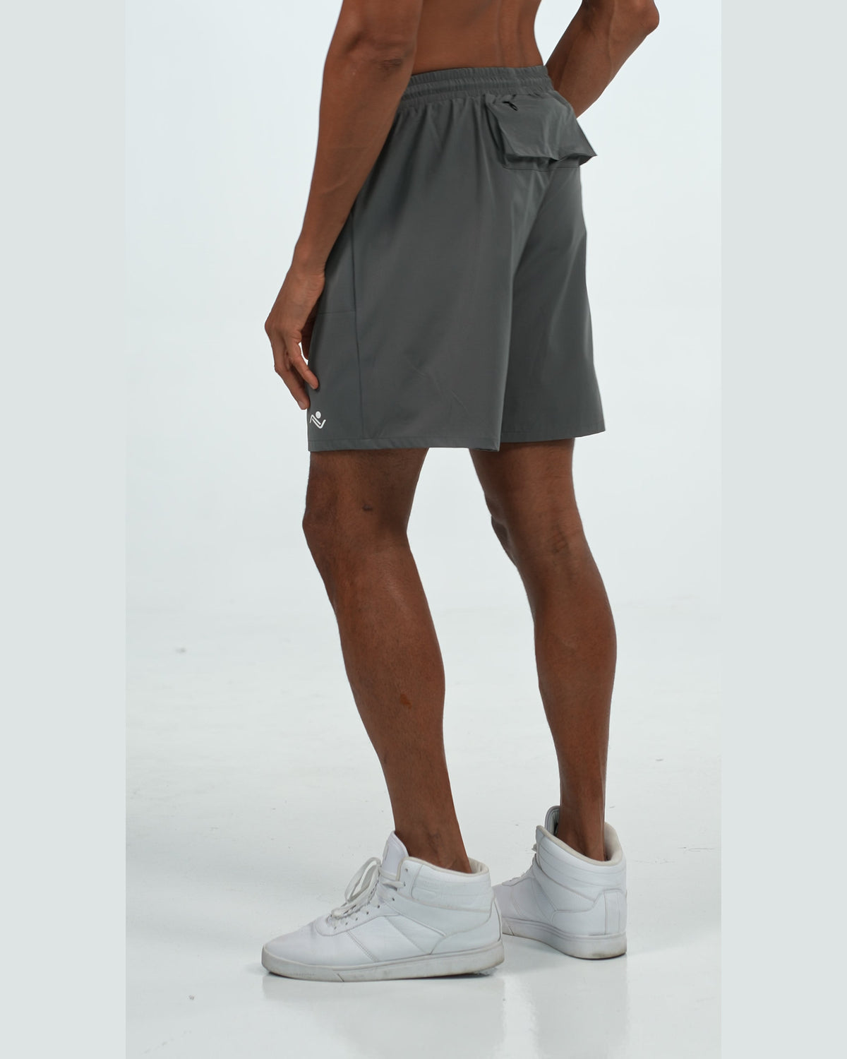 Zip Pocket Training Shorts in Charcoal, side on model, Ascendia