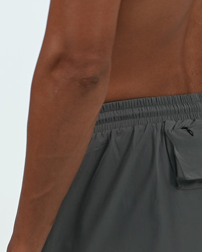 Zip Pocket Training Shorts in Charcoal, back zip pocket detail on model, Ascendia