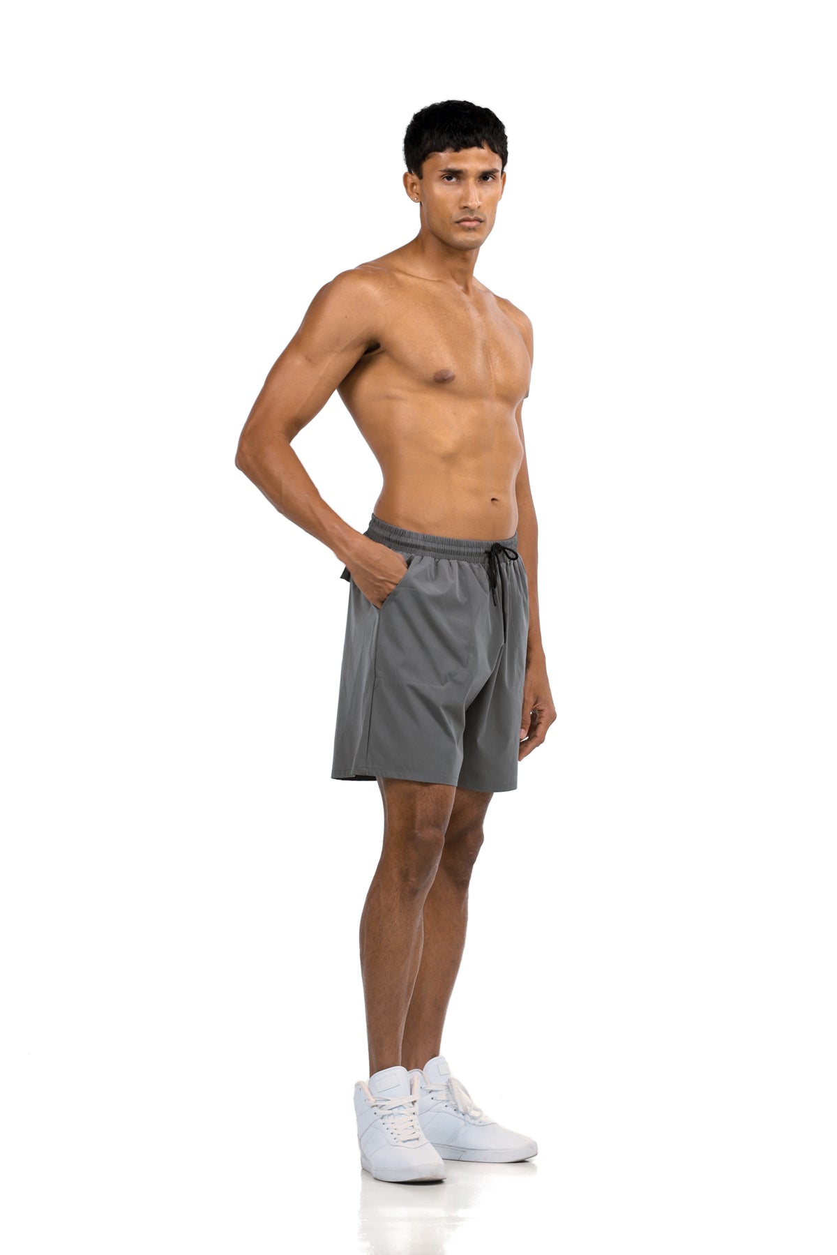 Men's Zip Pocket Running Shorts in Charcoal, three-quarter front view on model, Ascendia