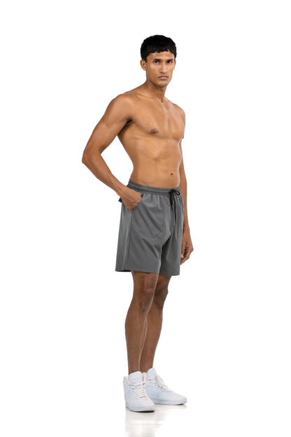Men's Zip Pocket Running Shorts in Charcoal, three-quarter front view on model, Ascendia