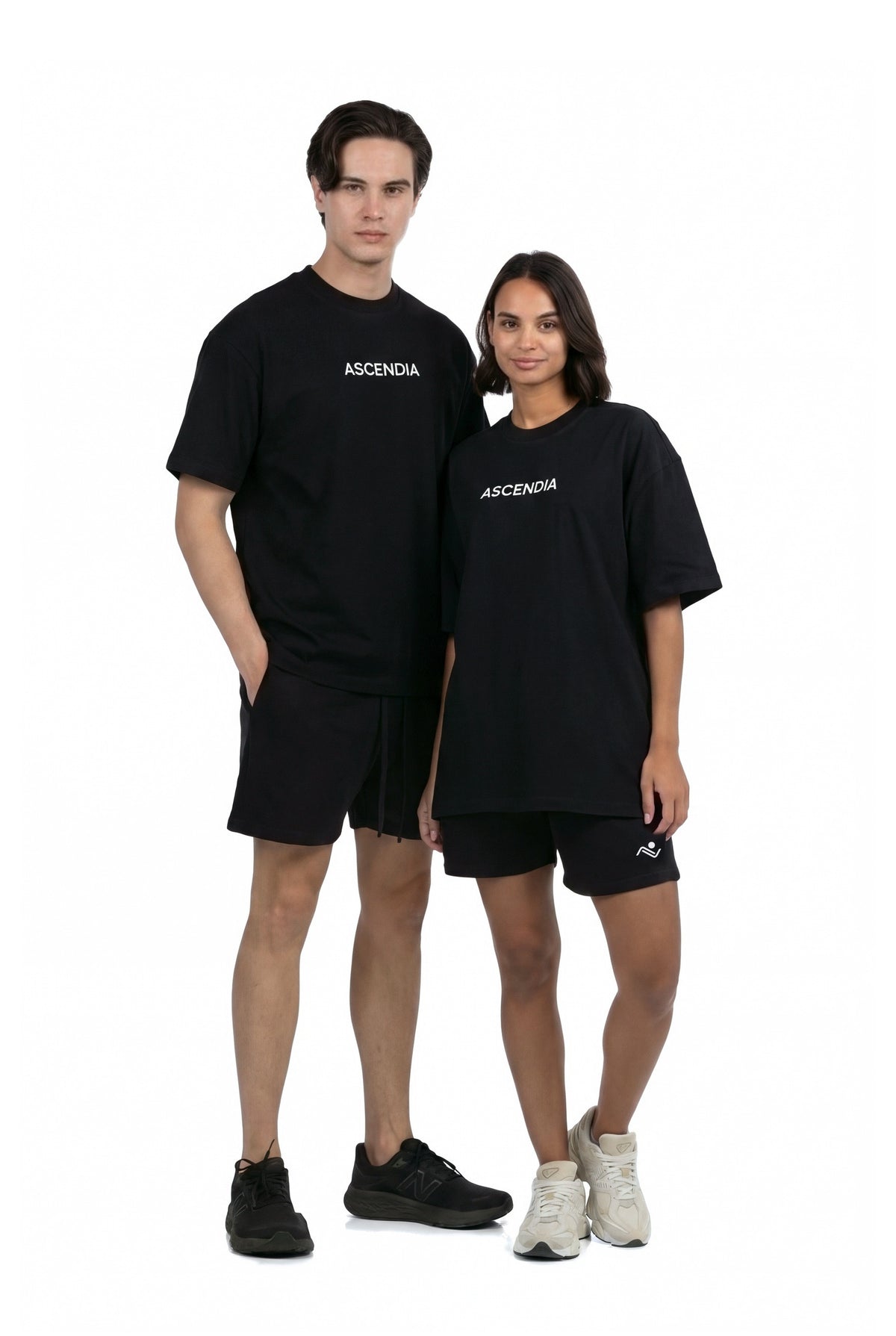 Workout Tee & Short Set in Black, male and female models standing side by side, Ascendia