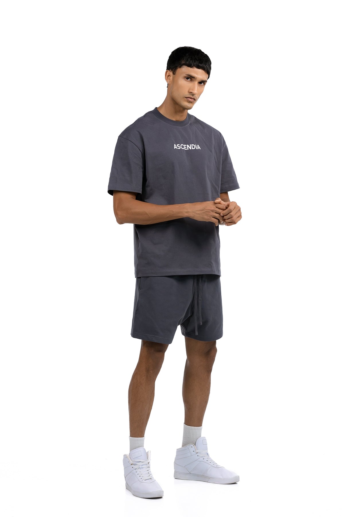Workout Tee & Short Set in Charcoal, three-quarter front view on male model, Ascendia