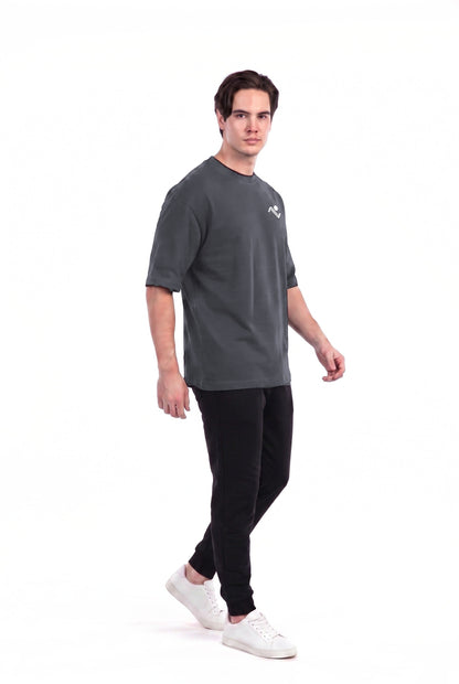 Men's Oversized Cotton Gym T-Shirt in Charcoal, three-quarter view on male model, Ascendia