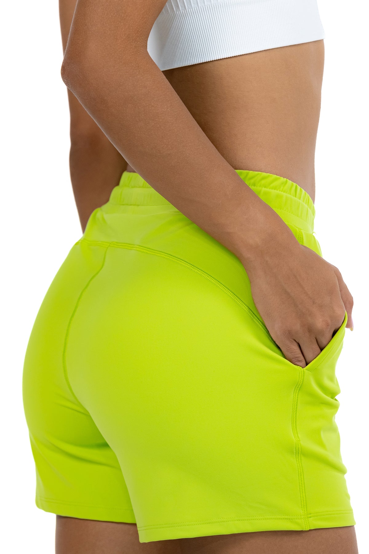 High Waist Running Shorts in Lime, three-quarter back view showing the pocket, Ascendia