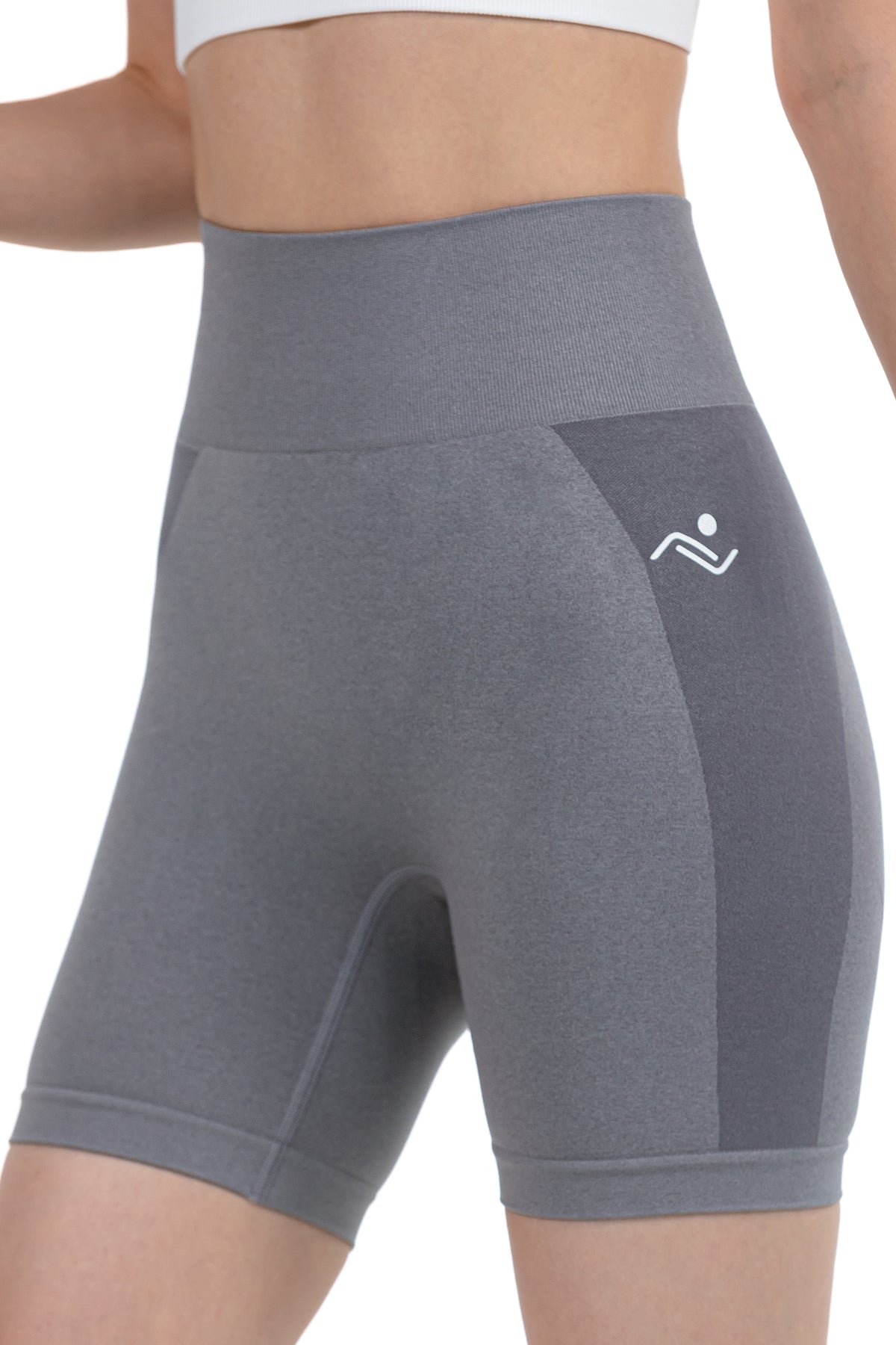 Seamless Ribbed Yoga Shorts in Dark Grey, three-quarter view showing the hip logo, Ascendia