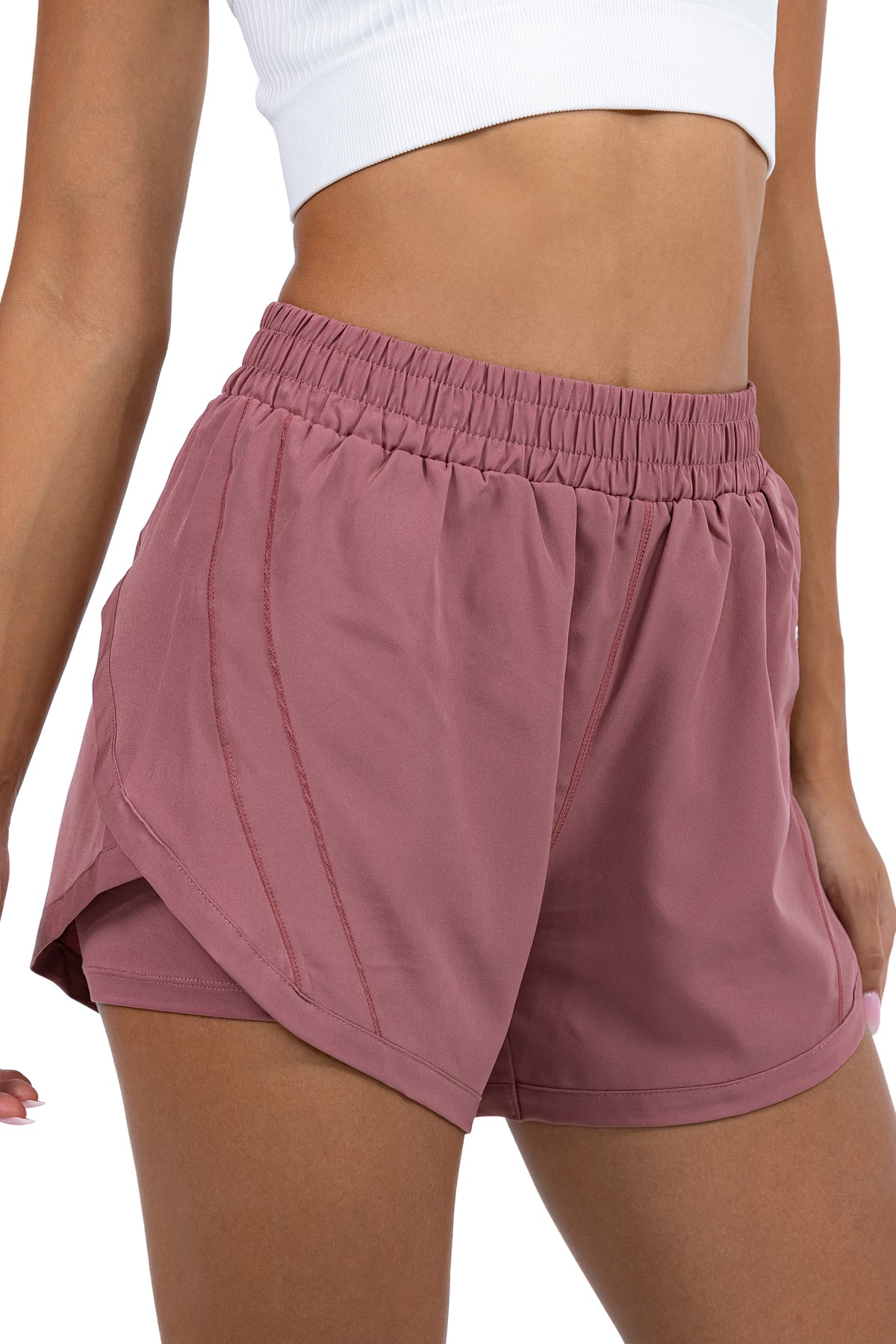 Women's 2-in-1 Running Shorts in Dusty Rose, side view on model, Ascendia
