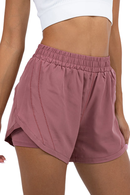 Women's 2-in-1 Running Shorts in Dusty Rose, side view on model, Ascendia