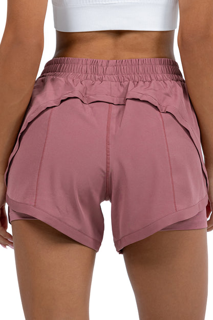 Women's 2-in-1 Running Shorts in Dusty Rose, back view on model, Ascendia
