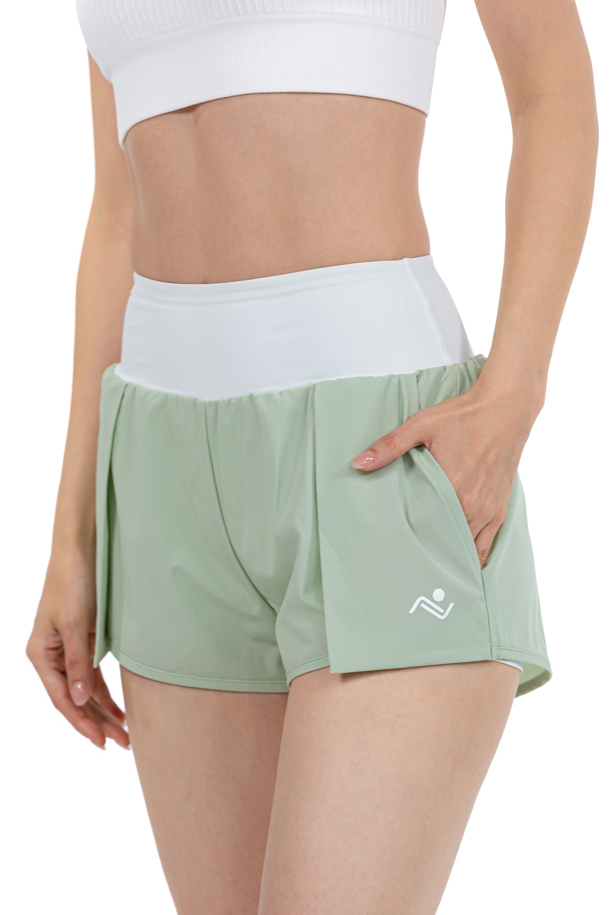 Women's Fitness Sport Shorts in Sage, three-quarter view on model, Ascendia