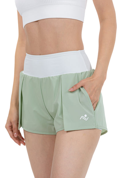 Women's Fitness Sport Shorts in Sage, three-quarter view on model, Ascendia