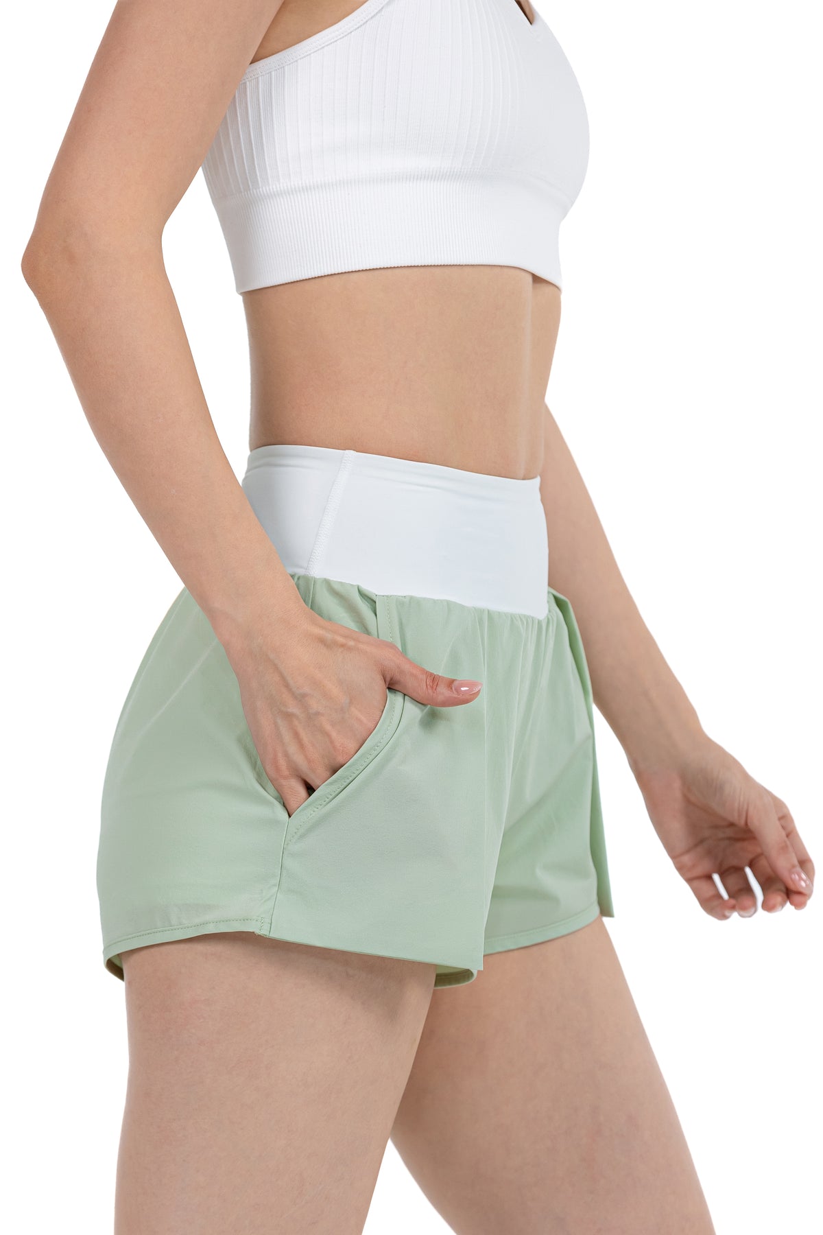 Women's Fitness Sport Shorts in Sage, side view on model, Ascendia