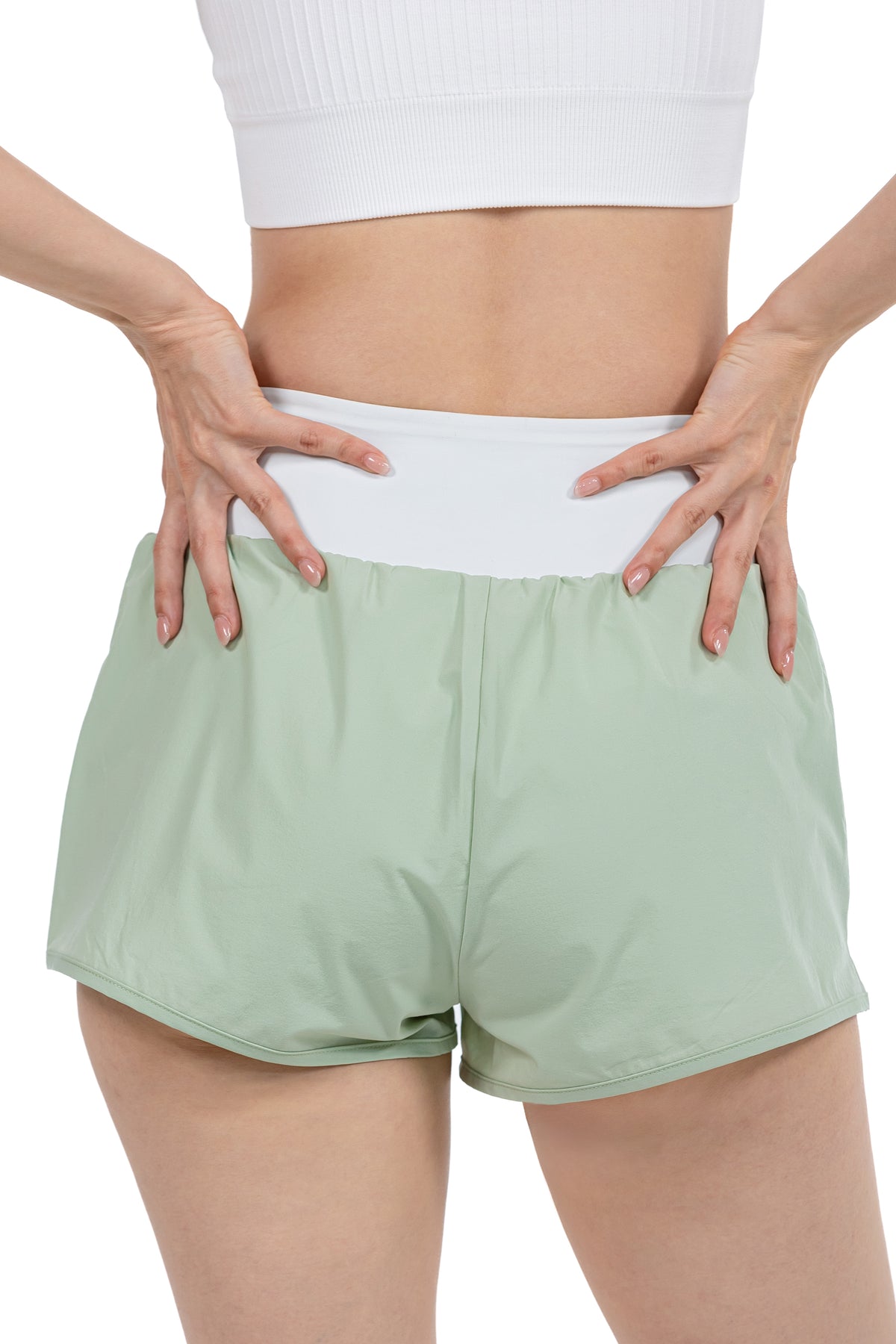 Women's Fitness Sport Shorts in Sage, back view on model, Ascendia