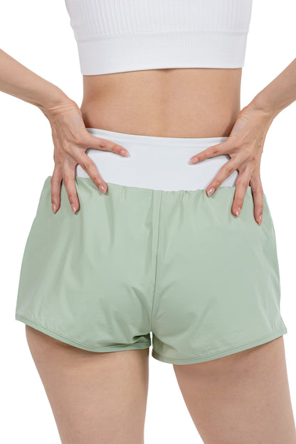 Women's Fitness Sport Shorts in Sage, back view on model, Ascendia