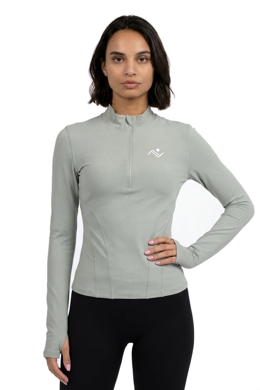 Semi-Zip Windproof Fitness Top in Sage, front view on model with hand on hip, Ascendia