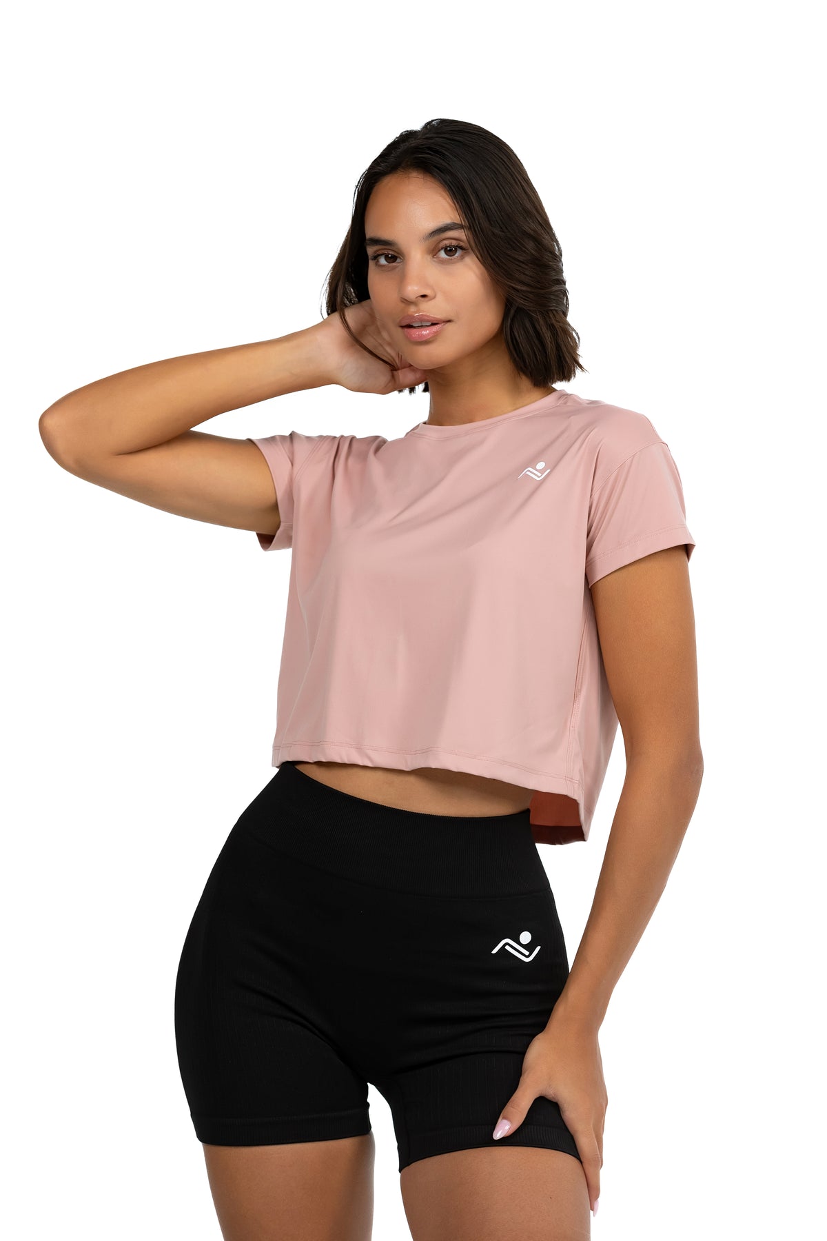 Women's Crop Tee in Blush, front view showing the cropped hem, Ascendia