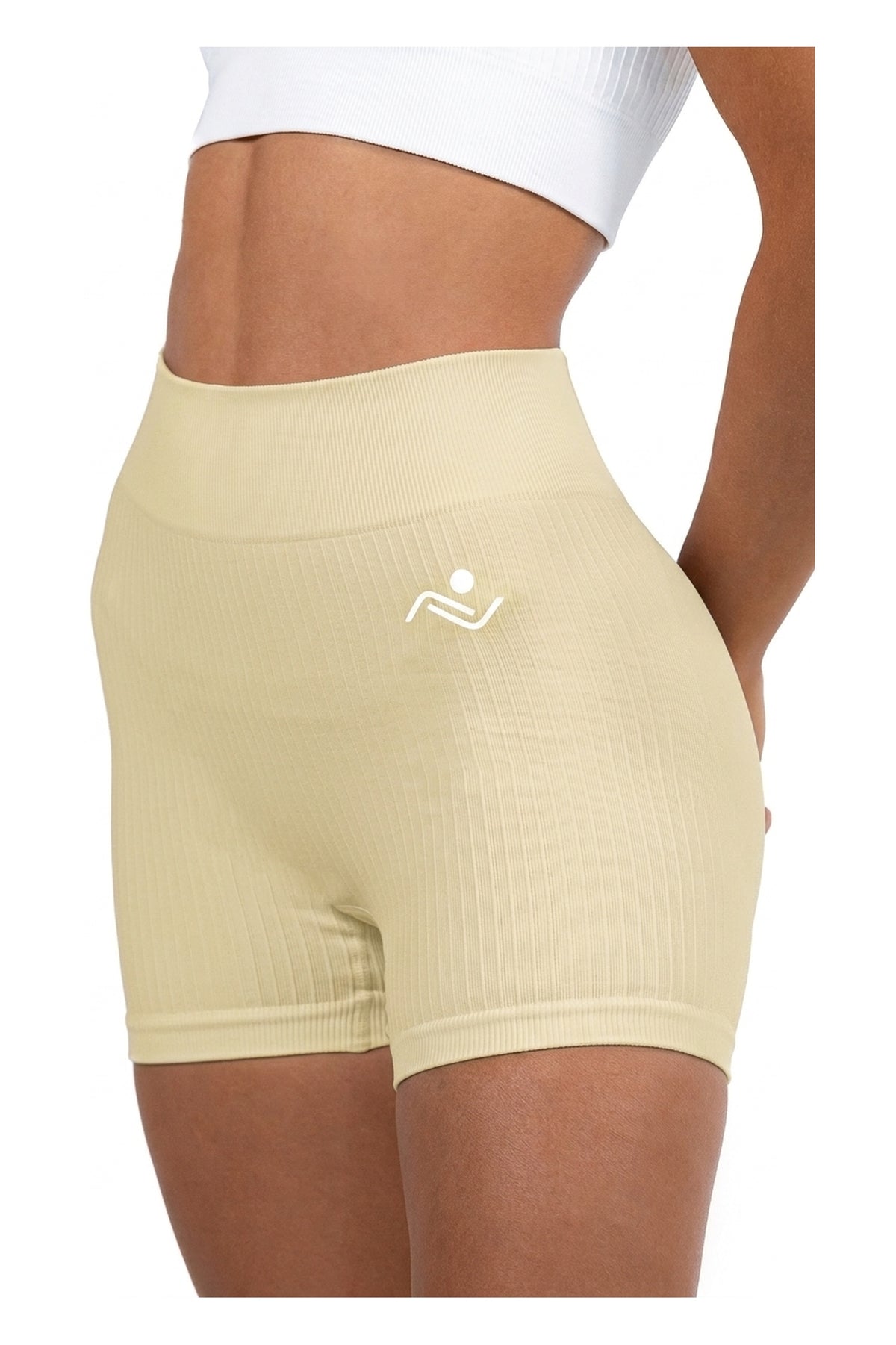 Shape Sculpt Fitness Shorts in Beige, three-quarter front view showing the ribbed leg, Ascendia