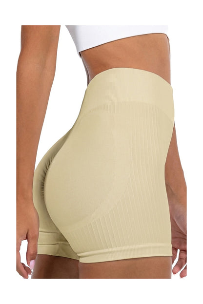Shape Sculpt Fitness Shorts in Beige, close back view showing the ruched seat and ribbed hem, Ascendia