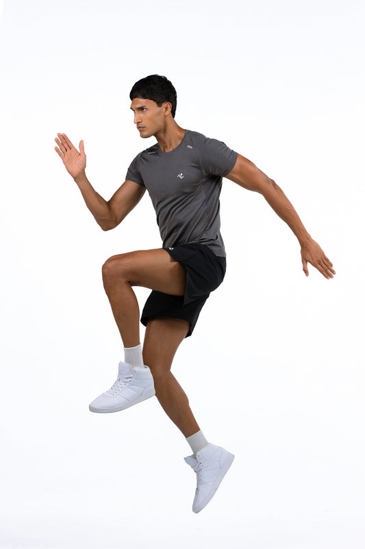 Men's Gym Fit T-Shirt in Gray, full-length action shot mid-jump, Ascendia
