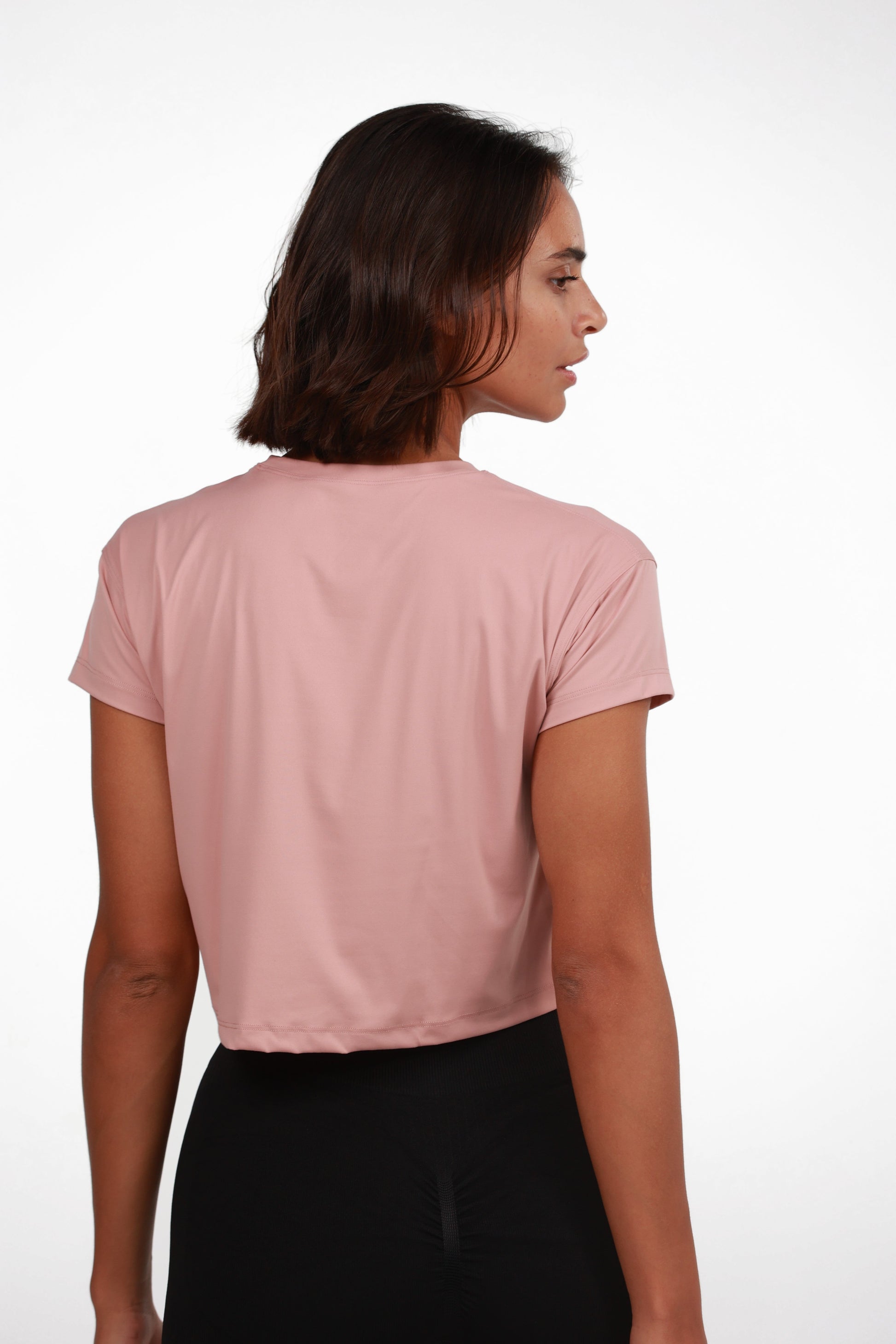 Women's Crop Tee in Pink, back view on model, Ascendia