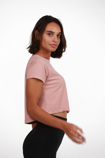 Women's Crop Tee in Pink, side profile view on model, Ascendia