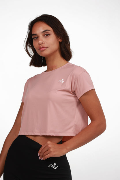 Women's Crop Tee in Pink, three-quarter front view on model, Ascendia